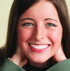 woman in green shirt
